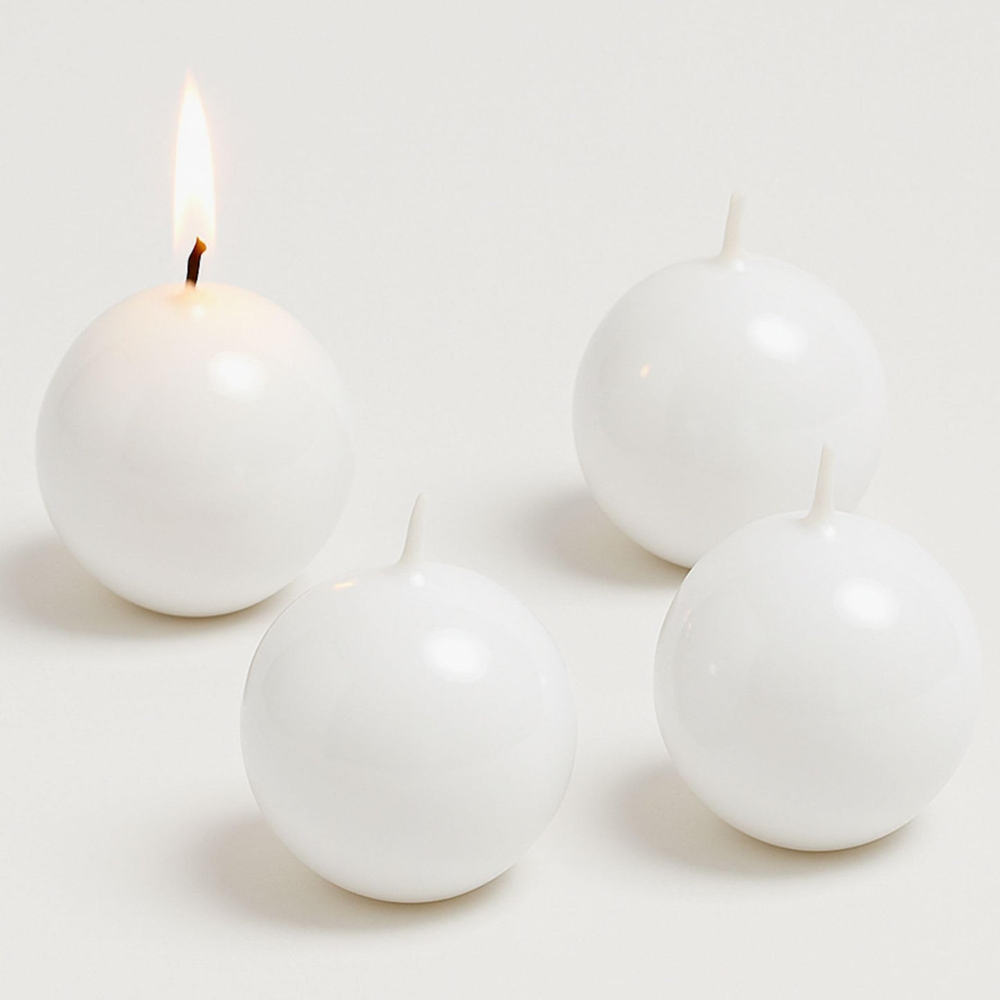 Biedermann & Sons Ivory Round Candles (Set of 4), Unscented Dripless Balls, 2.5" Spheres, 8 Hour Burn, for Mantels Shelves and Tabletop Displays