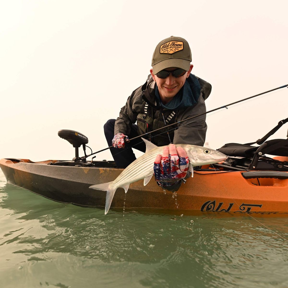 Old Town Sportsman AutoPilot 136 Motorized Fishing Kayak with Minn Kota Trolling Motor (Ember Camo)