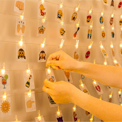 HXWEIYE 50LEDs Photo String Light, Warm White 16.4Ft Battery Powered Fairy Light with 52 Clear Clips & 10 Hooks on Wall for Hanging Picture Dorm Bedroom Party