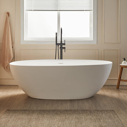 Cpingao 63" Solid Surface Freestanding Bathtub, Modern Oval Shape Soaking Tub, Stone Resin Stand Alone Bathtub with Drain & Integrated Slotted Overflow Matte White 8845-1600