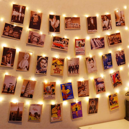 HXWEIYE 50LEDs Photo String Light, Warm White 16.4Ft Battery Powered Fairy Light with 52 Clear Clips & 10 Hooks on Wall for Hanging Picture Dorm Bedroom Party