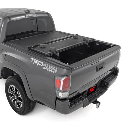 Rough Country Hard Low-Profile Tri-Fold Tonneau Cover for Toyota Tacoma (2016–2023) - Low-Profile Aluminum Truck Bed Cover, Fits 6' Bed (72.5")