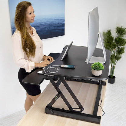 Mount-It! Electric Standing Desk Converter 35.4" Quick Sit Stand Desk Riser, Computer Workstation Motorized Easy Convertor with Built-in USB Charging Port, Ergonomic Height Adjustable in Black