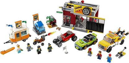 LEGO City Tuning Workshop 60258 Features a Toy Garage Car Shop Camping Trailer Motorcycle Crane and Tow Truck in One Fun Playset Makes a Great Gift for Kids