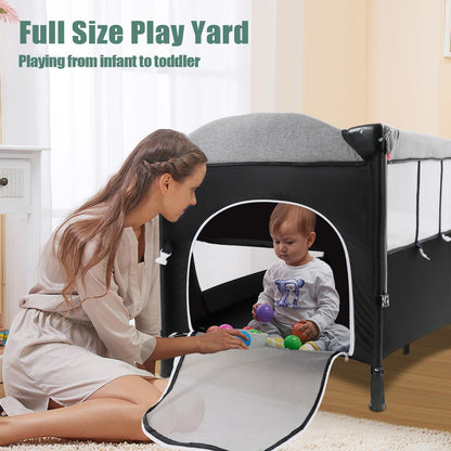 MMBABY 5-in-1 Pack and Play Portable Crib for Baby,Multifunction Bedside Crib from Newborn to Toddlers,U-Shaped Diaper Changer,Playard,Safety Strap,Carry Bag (Black)