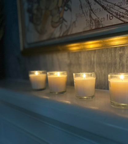 Stonebriar 48 Pack Unscented Long Burning Clear Glass Ivory Wax Filled Votive Candles