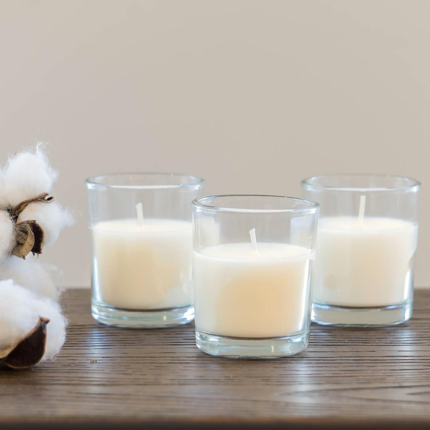 Stonebriar 48 Pack Unscented Long Burning Clear Glass Ivory Wax Filled Votive Candles