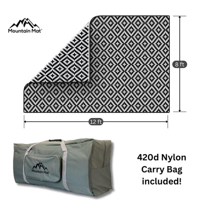 Mountain Mat Premium Plastic Outdoor Rug – Size 8' x 12' – Sand-Free Made from 100% Recycled Plastic – for Campsites, Tents, RVs, Campers, and Patios – with Durable Carry Bag and Grommets (Black)