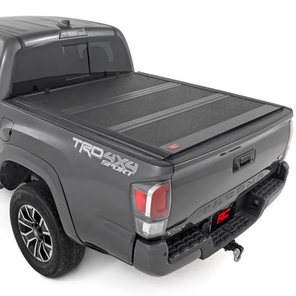 Rough Country Hard Low-Profile Tri-Fold Tonneau Cover for Toyota Tacoma (2016–2023) - Low-Profile Aluminum Truck Bed Cover, Fits 6' Bed (72.5")