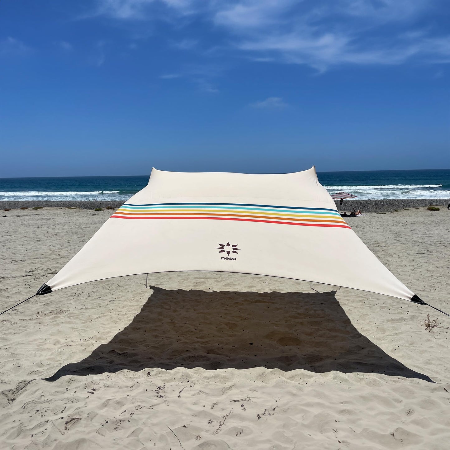 Neso Gigante Portable Beach Tent Sun Shelter - Lightweight Beach Shade Canopy - Easy Setup for Family Outings - Patented Reinforced Corners - UPF 50+ Sun Protection - 8ft Tall, 11 x 11ft - Rainbow