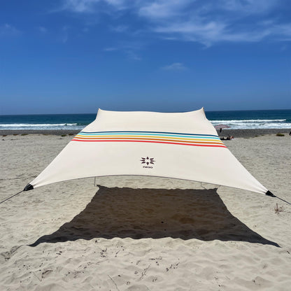 Neso Gigante Portable Beach Tent Sun Shelter - Lightweight Beach Shade Canopy - Easy Setup for Family Outings - Patented Reinforced Corners - UPF 50+ Sun Protection - 8ft Tall, 11 x 11ft - Rainbow