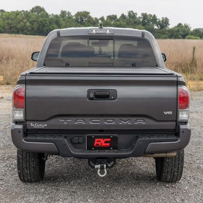 Rough Country Hard Low-Profile Tri-Fold Tonneau Cover for Toyota Tacoma (2016–2023) - Low-Profile Aluminum Truck Bed Cover, Fits 6' Bed (72.5")