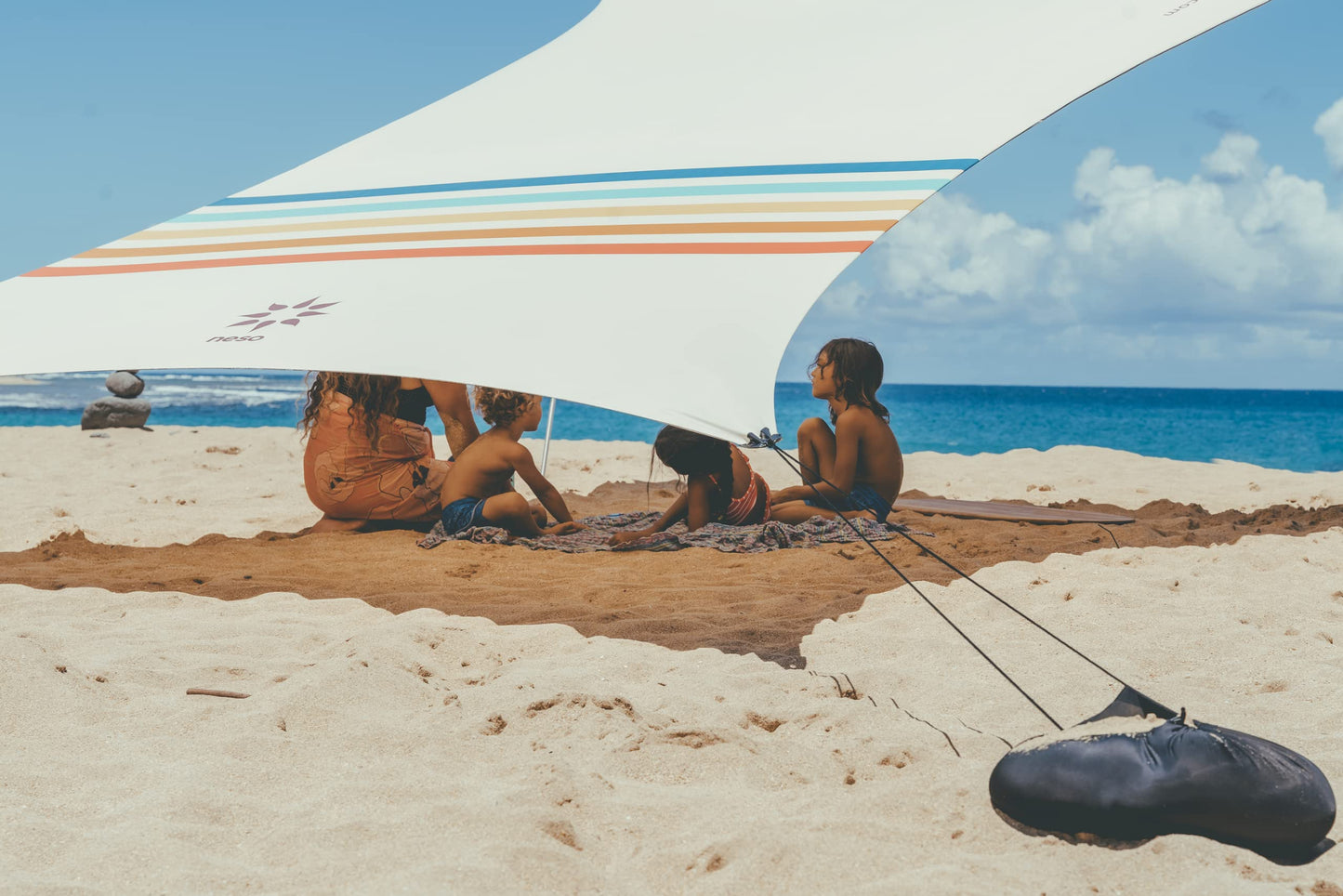 Neso Grande Portable Beach Tent Sun Shelter - Lightweight Beach Shade Canopy - Easy Setup for Family Outings - Patented Reinforced Corners - UPF 50+ Sun Protection - 7ft Tall, 9 x 9ft - Rainbow