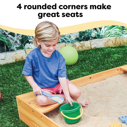 KidKraft Wooden Backyard Sandbox with Built-in Corner Seating and Mesh Cover, Kid's Outdoor Furniture, Honey, Gift for Ages 2-8