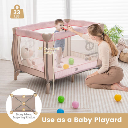 Costzon 3 in 1 Pink Pack and Play with Bassinet, Portable Baby Playard with Changing Table, Music Box, Hangings, Wheels/Brake, Basket, Foldable Infant Pink Bassinet Crib for Baby Girl Toddlers