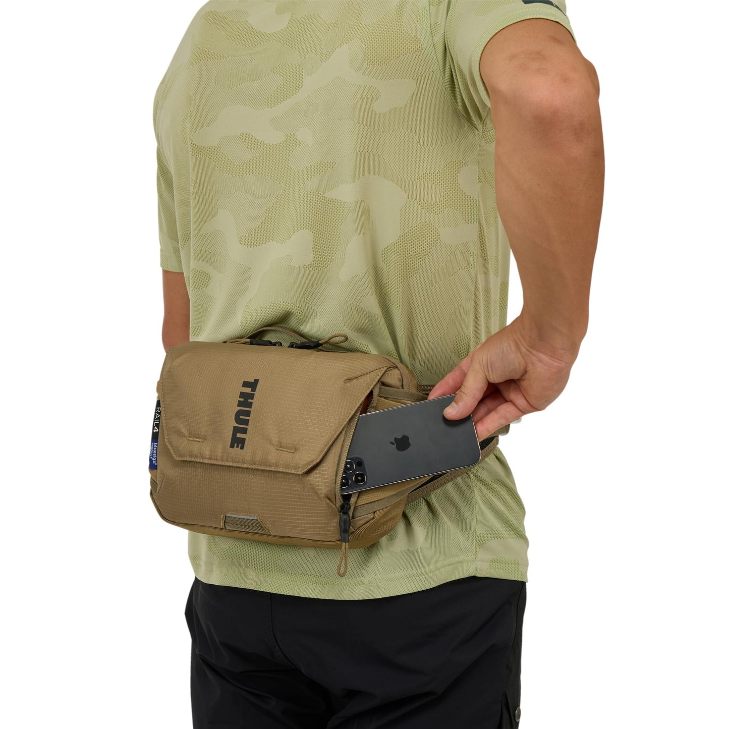Thule Rail Hip Pack 4L - Soft Zippered Phone Pocket - 1.5L Water Bladder Included with Magnetic Hose Sleeve - External Elastic Nutrition Pockets - Inner Pockets for Organization