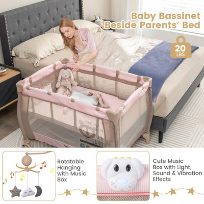 Costzon 3 in 1 Pink Pack and Play with Bassinet, Portable Baby Playard with Changing Table, Music Box, Hangings, Wheels/Brake, Basket, Foldable Infant Pink Bassinet Crib for Baby Girl Toddlers