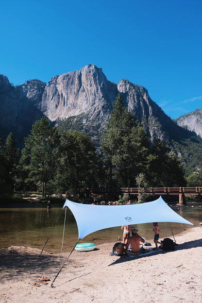 Neso Sidelines Grande Sports Tent - Lightweight and Portable Sun Shelter and Shade Tent for Outdoor Activities - Patented Reinforced Corners - UPF 50+ - 7ft Tall, 11 x 4.5 ft - Periwinkle Blue