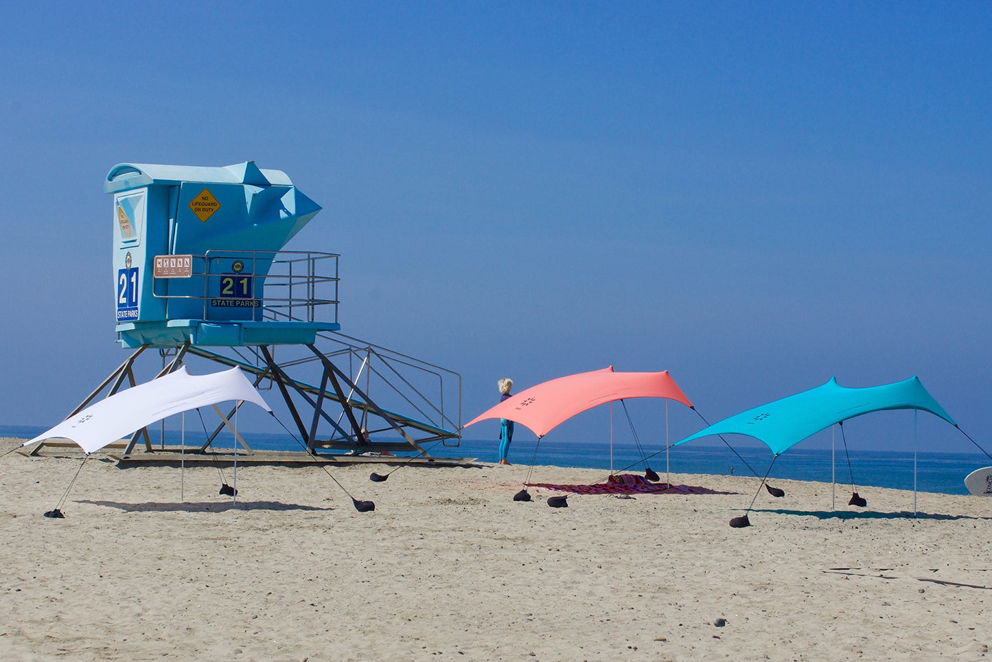 Neso Portable Beach Tent Sun Shelter with Sand Anchor - Lightweight Beach Shade Canopy - Easy Setup for Family Outings - Patented Reinforced Corners - UPF 50+ Sun Protection - 7 x 7ft - White
