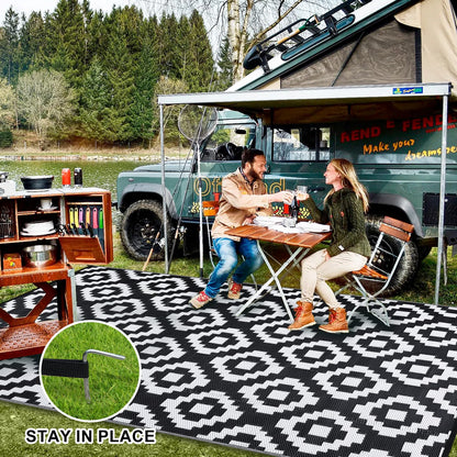GlowSol Waterproof Outdoor Rug 9x18 Reversible Outdoor Plastic Straw Rug Camping RV Carpet Outside Modern Geometric Foldable Patio Mat for Porch,Deck,Backyard,Balcony,Picnic,Beach,Black White