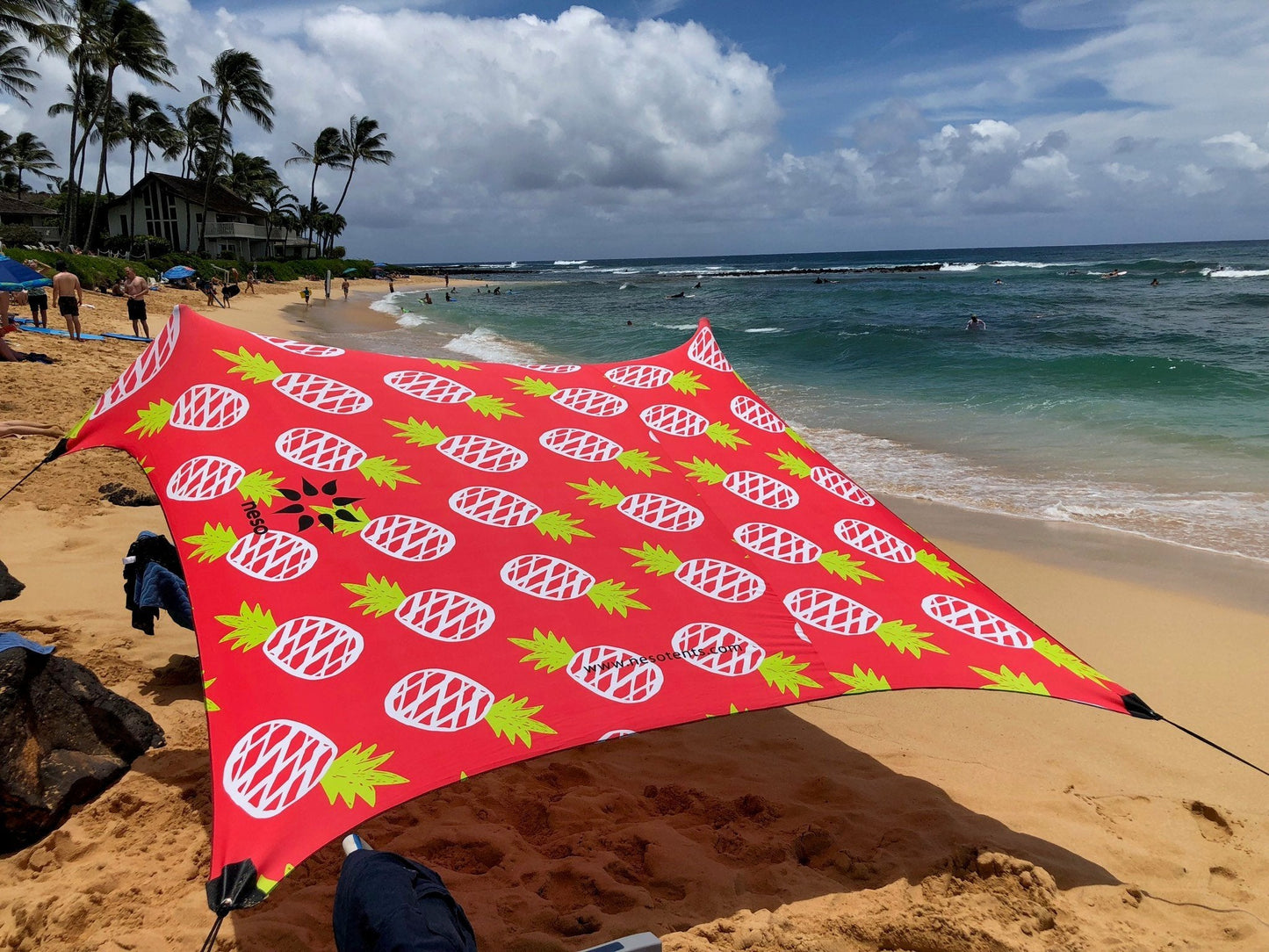 Neso Portable Beach Tent Sun Shelter with Sand Anchor - Lightweight Beach Shade Canopy - Easy Setup for Family Outings - Patented Reinforced Corners - UPF 50+ - 7 x 7ft - Pineapples