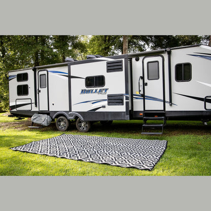 Mountain Mat Premium Plastic Outdoor Rug – Size 8' x 12' – Sand-Free Made from 100% Recycled Plastic – for Campsites, Tents, RVs, Campers, and Patios – with Durable Carry Bag and Grommets (Black)