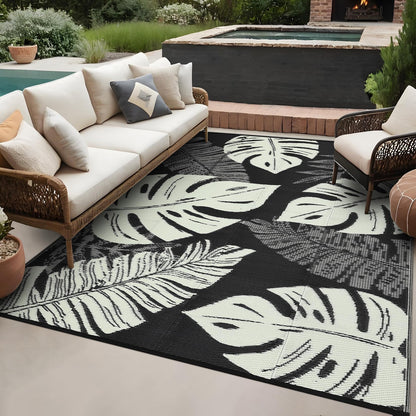 MilleLoom Waterproof Plastic Straw Outdoor Rug 9x18 Patio Reversible UV Resistant Foldable Camping Carpet Modern Leaf Print Large Outdoor Rugs for Deck, Porch, Camper, Balcony, Beach，Black/Beige
