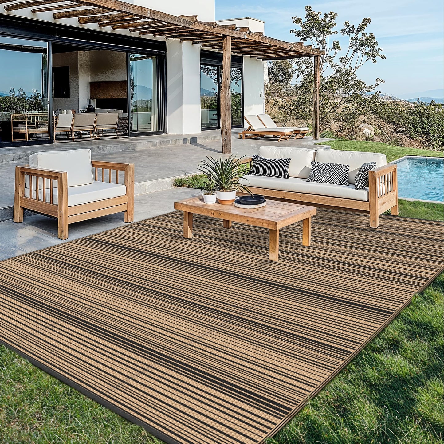 GENIMO Outdoor Rug for Patio Clearance, 10'x14' Reversible Plastic Straw Rugs, Lightweight Waterproof RV Camping Mat for Camper, Balcony, Deck, Backyard, Picnic, BlackBrown