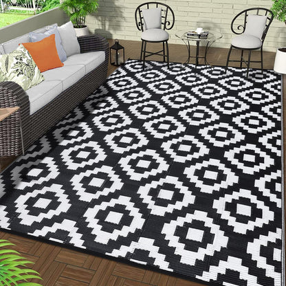 GlowSol Waterproof Outdoor Rug 9x18 Reversible Outdoor Plastic Straw Rug Camping RV Carpet Outside Modern Geometric Foldable Patio Mat for Porch,Deck,Backyard,Balcony,Picnic,Beach,Black White