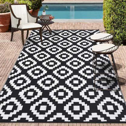 GlowSol Waterproof Outdoor Rug 9x18 Reversible Outdoor Plastic Straw Rug Camping RV Carpet Outside Modern Geometric Foldable Patio Mat for Porch,Deck,Backyard,Balcony,Picnic,Beach,Black White