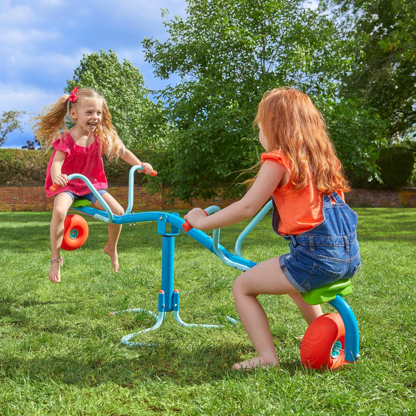 TP Toys Spiro Spin Teeter Totter - Bounces and Spins 360 Degrees, Blue/Green